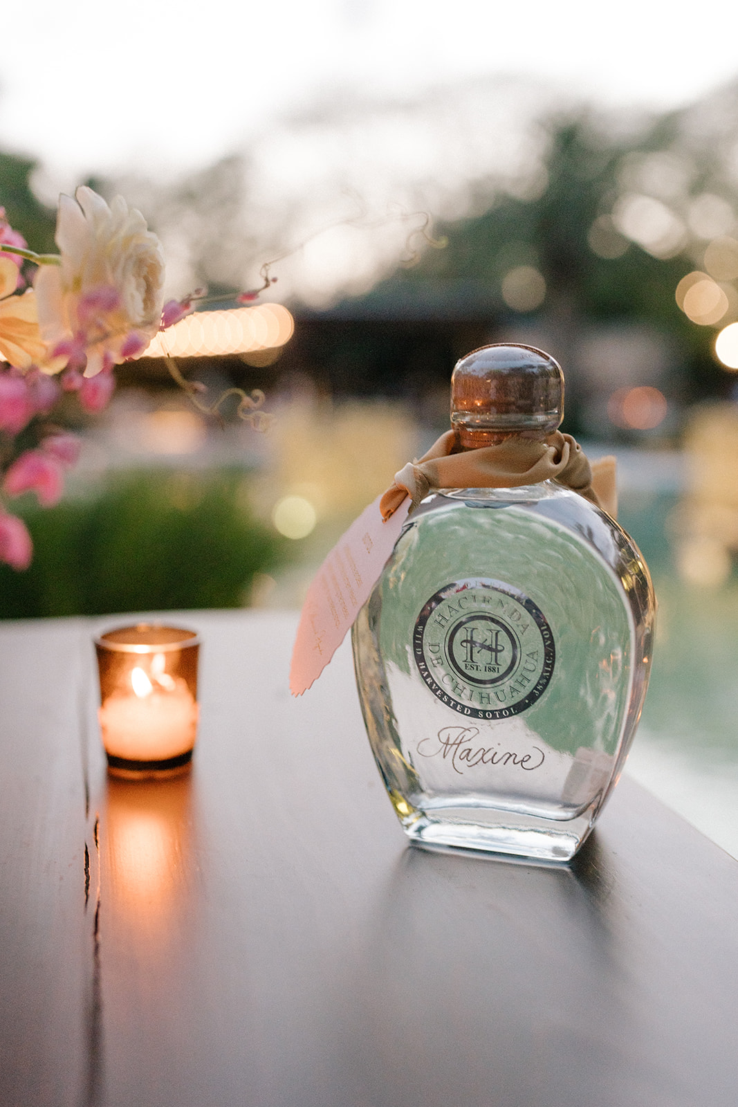 Detail shot of a bottle of Sotol hand-engraved by Cat Lauren Calligraphy